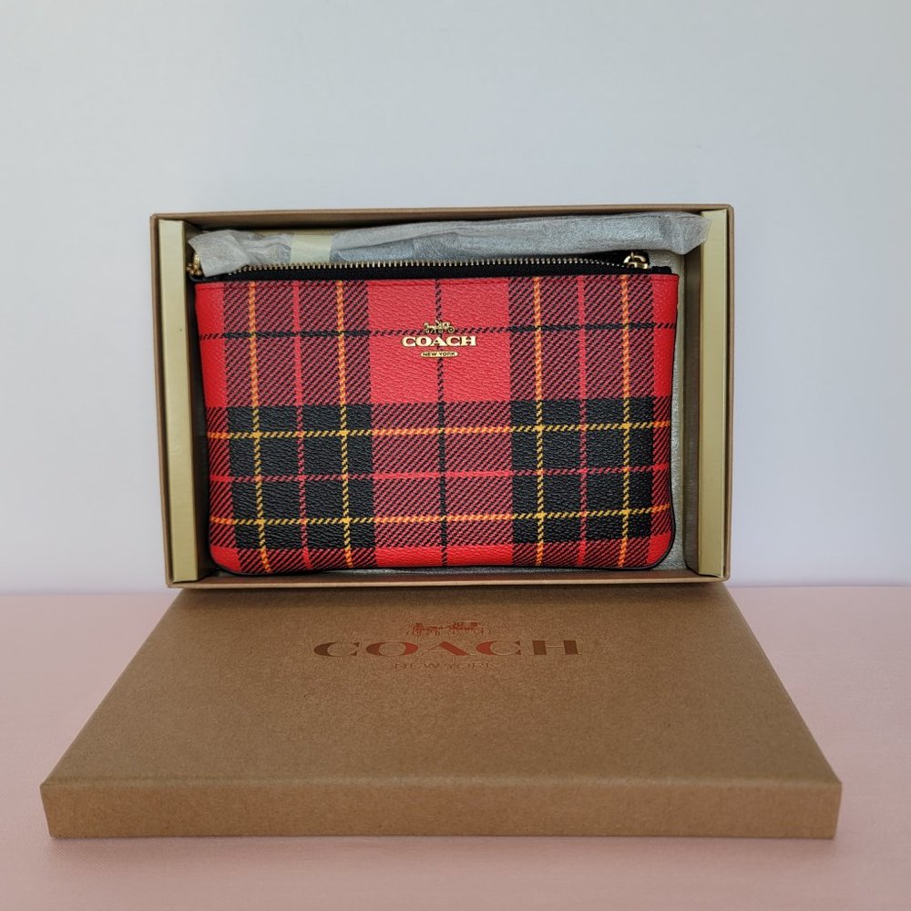 COACH Small Printed Plaid Coated Canvas Wristlet- Red Multi $75. ⭐